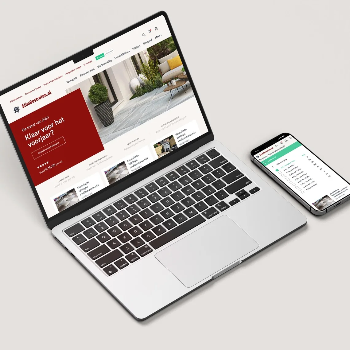Desktop- en mobiele weergave van het vernieuwde SlimBestraten.nl